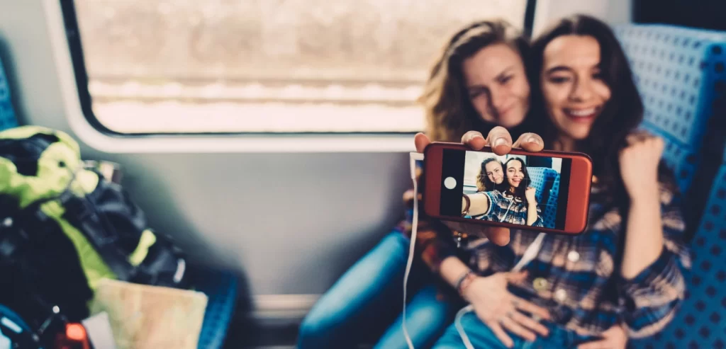 Two young ladies making user generated content.