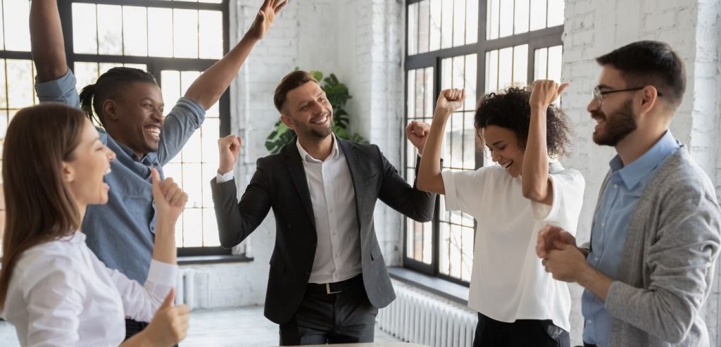 Co-workers celebrate a win.